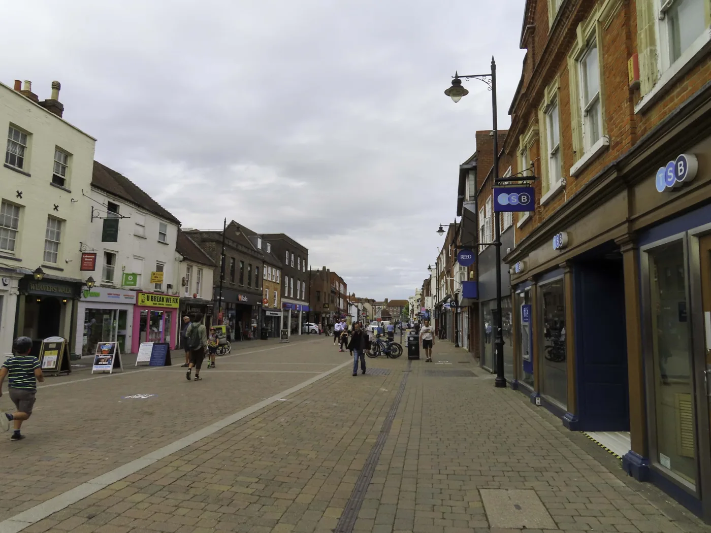 Northbrook Street in Newbury. Flats above the town-centre shops are emptied from communal bin stores rather than at the kerb, so the three-weekly cycle does not apply to them